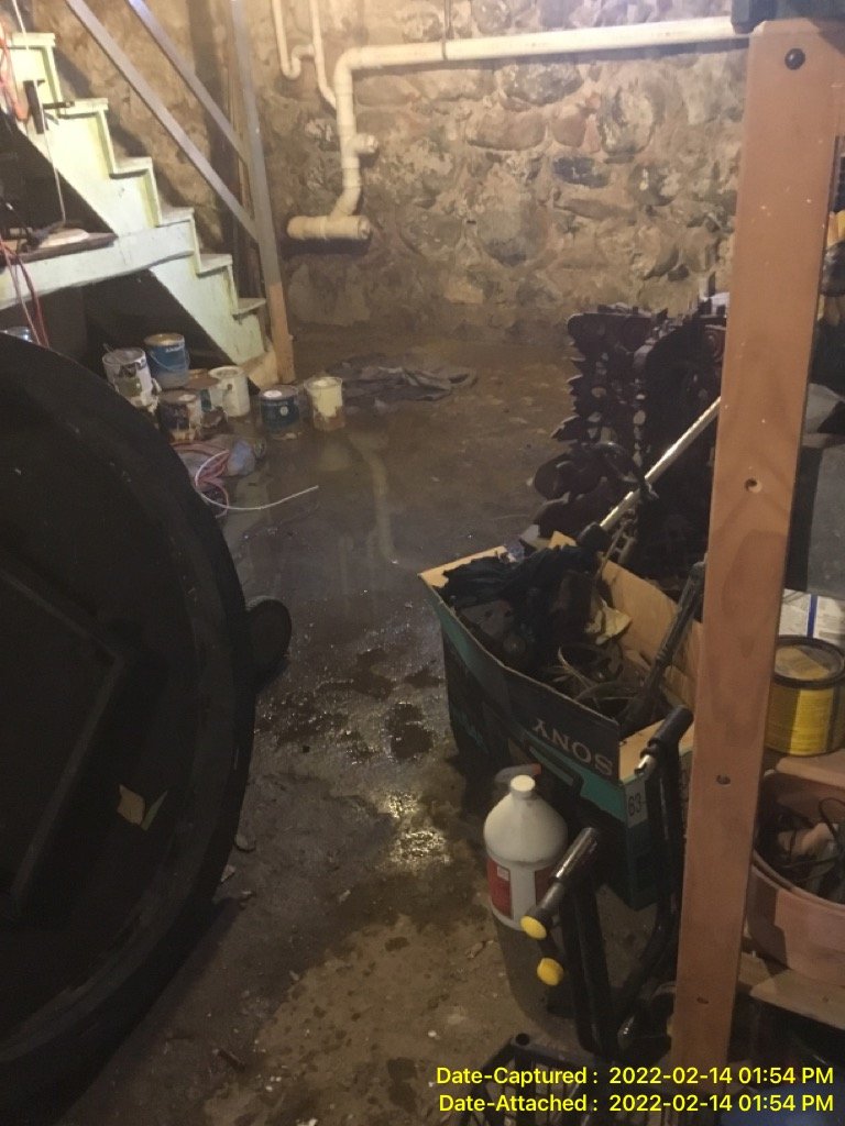 Severe water damage on the floor of basement